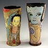 Nice pair of hand built and decorated cups